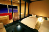 Guest room with semi-outdoor hot spring bath